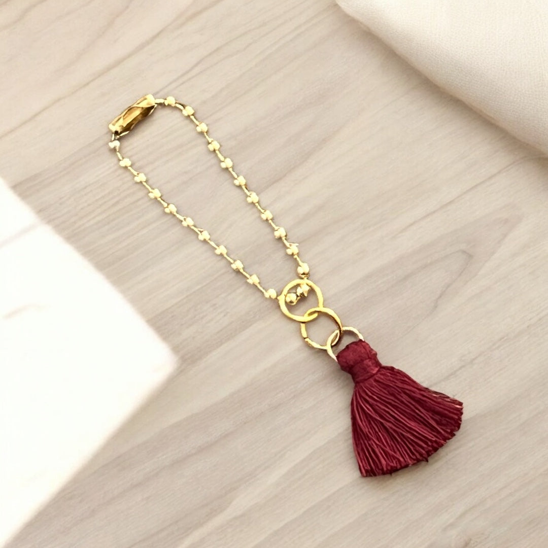 Crimson Tassel Handle Charm